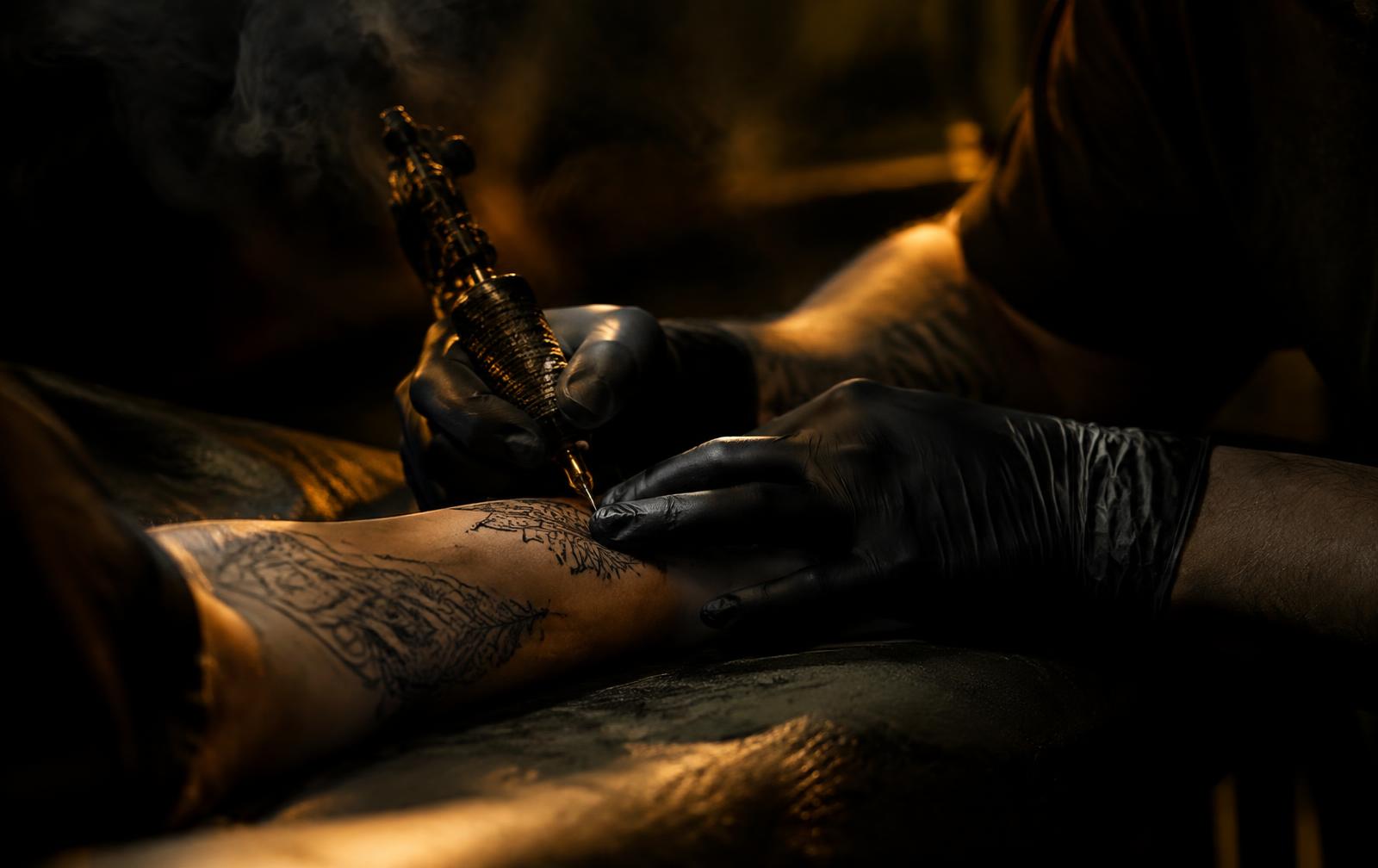 Tattoo artist at work
